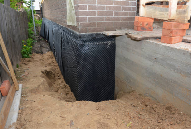 Happy homeowners after waterproofing job in Finksburg
